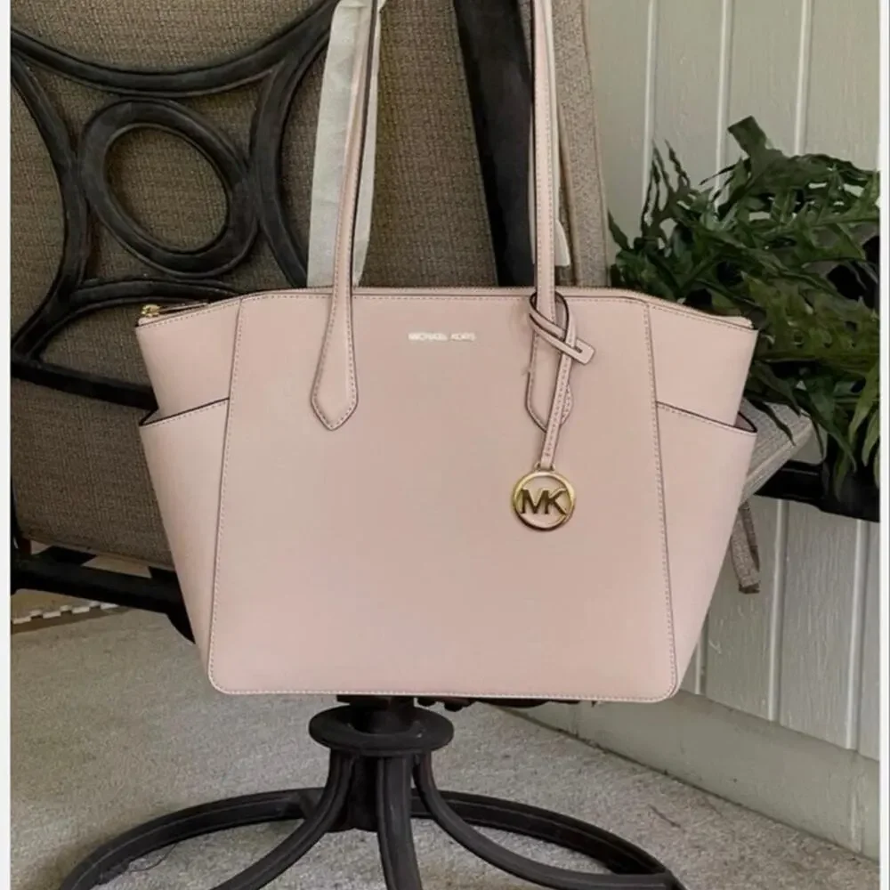 This is a new Michael Kors Marilyn MD Tote bag in a powder blush pink color, mad